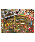 Collection of various fishing lures on a wooden background with a tackle box.